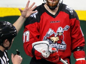 Curtis Dickson receives the ball from the ref as the Calgary Roughnecks battled the Buffalo Bandits at the Scotiabank Saddledome in Calgary, Alta., on April 8, 2017, Dickson scored five goals in a 15-11 loss to the Vancouver Stealth on Saturday.