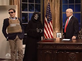 (From left to right) Jimmy Fallon as Jared Kushner, the "Grim Reaper" as Steve Bannon, Alec Baldwin as Donald Trump and Beck Bennett as Mike Pence on the April 15, 2017, episode of "Saturday Night Live." (Video screenshot)