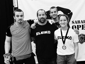 The Santavy family, Boady, Dalas, Noah and Alana, are pictured at the recent Ontario Junior Championship. Noah and Boady have qualified to lift at junior worlds in Tokyo in June. (Handout)