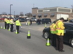 Kingston Police and their Community Volunteers conduct a voluntary toll at Walmart on Saturday to raise funds for Special Olympics Ontario. Photo Courtesy of Kingston Police