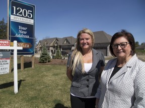 London realtors Angela Wilson and her mother Linda are seeing lots of Toronto realtors looking for deals for Toronto buyers as the London-area housing market turns red hot.  (MIKE HENSEN, The London Free Press)