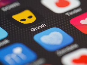 The "Grindr" app logo is seen amongst other dating apps on a mobile phone screen on Nov. 24, 2016 in London, England. (Leon Neal/Getty Images)