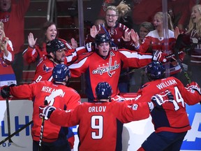 Capitals centre Nicklas Backstrom (19) celebrates his goal with Alex Ovechkin (8), Matt Niskanen (2), Dmitry Orlov (9) and Justin Williams (14) against the Maple Leafs during Game 2 of their first-round playoff series in Washington on Saturday, April 15, 2017. (Molly Riley/AP Photo)