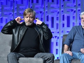 Mark Hamill and George Lucas attend the Star Wars Celebration Day 1 on April 13, 2017 in Orlando, Florida. (Photo by Gustavo Caballero/Getty Images)