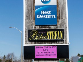 The longtime sign at the Best Western Fireside Inn on Princess Street gets a new look but keeps its historic profile after a corporate-wide rebranding. (Julia McKay/The Whig-Standard)