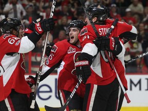 Senators' Chris Wideman (centre) celebrates his third period goal against the Bruins in Game 2 of their first-round playoff series on Saturday, April 15, 2017. (Tony Caldwell/Postmedia)