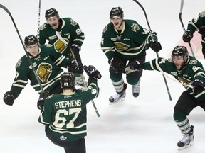 Mitchell Stephens of the London Knights celebrates his goal in OT over the Erie Otters. He's congratulated by (L-R) Robert Thomas, Victor Mete Brandon Crawley, captain JJ Piccinich and Janne Kuokkanen at Budweiser Gardens on Sunday April 16, 2017. Knights won 2-1 to force game 7 in Erie on Tuesday. (MIKE HENSEN, The London Free Press)