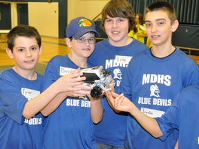 Although their robot “Jeffery” finished 7th overall out of 19 teams, that didn’t stop this MDHS team, comprised of Tyler Horton (left), David Price, Luke Snyders, Jayden Yanke and Seth Dow, all Grade 7 students, from enjoying the Robot Rally held at MDHS April 10. ANDY BADER/MITCHELL ADVOCATE