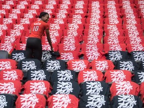 T-shirts are laid out on the seats of the Air Canada Centre as preparations are made for the Toronto Raptors' opening game against the Milwaukee Bucks for the NBA playoffs, in Toronto on Saturday, April 15, 2017. THE CANADIAN PRESS/Chris Young