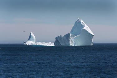 A large iceberg is visible from the shore in Ferryland, an hour south of St. John's, Newfoundland on Monday, April 10, 2017. More icebergs have drifted into major shipping lanes off Newfoundland, forcing ships to go far out of their way to steer clear of the massive ice mountains.THE CANADIAN PRESS/Paul Daly ORG XMIT: PD437