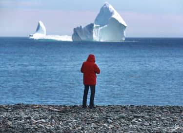 A large iceberg is visible from the shore in Ferryland, an hour south of St. John's, Newfoundland on Monday, April 10, 2017. More icebergs have drifted into major shipping lanes off Newfoundland, forcing ships to go far out of their way to steer clear of the massive ice mountains." THE CANADIAN PRESS/Paul Daly ORG XMIT: PD440