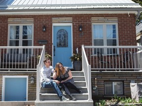 Sarah Blakely and her husband Curtis are pictured outside their three-bedroom home, in Toronto on Friday, April 14, 2017. (THE CANADIAN PRESS/Chris Young)