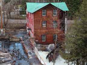 Water  from Brennan’s Creek floods through historic mill in Killaloe this week. (Photo by Lynn Flokstra)