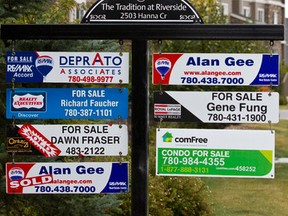 For sale signs in Edmonton in 2013.