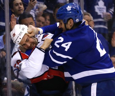 Daniel Winnik and Leafs Brian Boyle as the Toronto Maple Leafs host the Washington Capitals in the third game 3 of the their first round series at the Air Canada Centrein Toronto on Monday April 17, 2017. Michael Peake/Toronto Sun/Postmedia Network