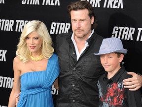 Tori Spelling, Dean McDermott and son Jack parade on the red carpet as she arrives at Grauman's Chinese Theatre in Hollywood for the premiere of the movie 'Star Trek' in Los Angeles on April 30, 2009. (MARK RALSTON/AFP/Getty Images)