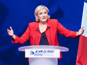 Far-right candidate for the presidential election Marine Le Pen speaks during a campaign meeting in Paris, France, Monday, April 17, 2017. As France's unpredictable presidential campaign nears its finish with no clear front-runner, centrist candidate Emmanuel Macron and far-right leader Marine Le Pen hope to rally big crowds in Paris with their rival visions for Europe's future. (AP Photo/Kamil Zihnioglu)