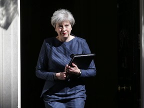 British Prime Minister Theresa May walks out of 10 Downing Street to make a statement to the media in central London on April 18, 2017. / AFP PHOTO / Daniel LEAL-OLIVASDANIEL LEAL-OLIVAS/AFP/Getty Images