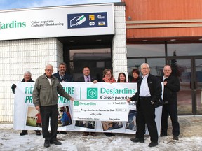 The Easter Food Drive held recently proven to be very successful for the Food Bank in part by the generous donation by Caisse Populaire Cochrane Témiskaming. Standing in front of the Caisse, Raymond Fortier, president Cochrane Food Bank  accepts a $ 5,000, cheque from president Denis Vallée. Also available for the photo were Gaston Gauthier (back) Claude Rocheleau, Manager of Food Bank, Gilles Belanger, manager of Caisse Populaire, Sarah Douma, Catherine Jansen, Lucie Chapleau of the Caisse and Don Narbonne