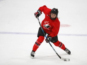 Canada's Jocelyne Larocque shoots during practice in preparation for the IIHF Women's World Championship hockey tournament, Thursday, March 30, 2017, in Plymouth, Mich. AP Photo/Paul Sancya