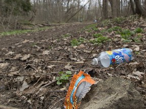 Garbage in a trail area which runs from Brentwood Park Road to Jaycee Sports Park has prompted one Brantford family to clean up litter in the area. Photographed on Sunday April 16, 2017 in Brantford, Ontario. (Brian Thompson/Brantford Expositor/Postmedia Network)