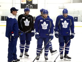Toronto Maple Leafs extras were the only ones on the ice at practice on April 18, 2017. Assistant coach D.J. Smith with Alexy Marchenko, Milan Michalek, Eric Fear and Nikita Shoshnikov. (Michael Peake/Toronto Sun/Postmedia Network)