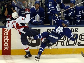 Washington Capitals defenceman Brooks Orpik collides with Toronto Maple Leafs forward Nazem Kadri during Game 3 in Toronto on April 17, 2017. (Jack Boland/Toronto Sun/Postmedia Network)