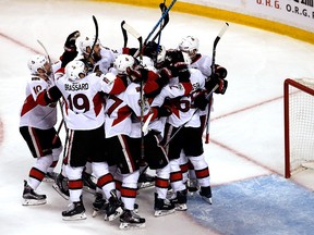 The Ottawa Senators celebrate a game-winning goal by Bobby Ryan during OT against the Boston Bruins in Game 3 at TD Garden on April 17, 2017. (Jim Rogash/Getty Images)