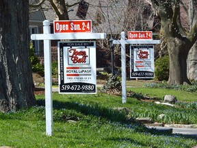 Real estate signs on Devonshire Avenue in London. (MORRIS LAMONT, The London Free Press)