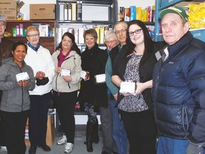 Residents and the manager of Sunrise Village in Drayton Valley helped deliver 100 hams to the local food bank on April 13, just in time for Easter.