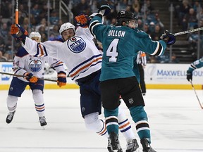 Brenden Dillon #4 of the San Jose Sharks collides with Leon Draisaitl #29 of the Edmonton Oilers during the third period in Game Three of the Western Conference First Round during the 2017 NHL Stanley Cup Playoffs at SAP Center on April 16, 2017 in San Jose, California.