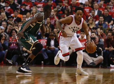 Milwaukee Bucks Tony Snell G (21)] defends against Toronto Raptors DeMar DeRozan G (10) during the first quarter of Game 2 in Toronto, Ont. on Tuesday April 18, 2017. Jack Boland/Toronto Sun/Postmedia Network