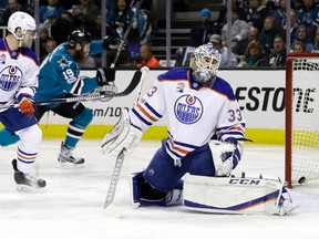 Edmonton Oilers goalie Cam Talbot (33) is beaten for a goal on a shot from San Jose Sharks' Joe Pavelski, not seen, during the first period in Game 4 of a first-round NHL hockey playoff series Tuesday, April 18, 2017, in San Jose, Calif.