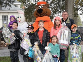 Winners of the 'special egg' prizes collected at the annual Tillsonburg Kinsmen Easter Egg Hunt Saturday morning at Memorial Park. (CHRIS ABBOTT/TILLSONBURG NEWS)