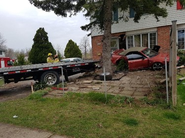 A man suffered serious injuries when the car he was driving crashed into a house 1732 Culver Drive in London, Ont., April 19, 2017. (HANDOUT PHOTO)