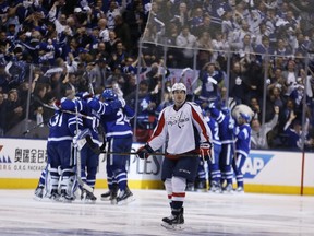 Jay Beagle in foreground as Maple Leafs celebrate their OT win over the Washington Capitals at the Air Canada Centre in Toronto on Monday, April 17, 2017. (Michael Peake/Toronto Sun)