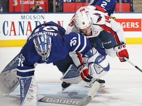 Justin Williams of the Washington Capitals bumps into goalie Frederik Andersen of the Toronto Maple Leafs during Game 3 at the Air Canada Centre on April 17, 2017. (Claus Andersen/Getty Images)