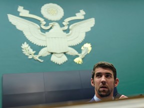 In this Feb. 28, 2017, file photo, Olympic swimmer Michael Phelps testifies on Capitol Hill in Washington, before the House Commerce Energy and Commerce subcommittee hearing on the international anti-doping system. (AP Photo/Susan Walsh, File)