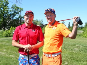 Ottawa Sun Scramble golf tournament organizers Andy Rajhathy (left) and Jamie Ryan. Rajhathy says the new TMSI City Championship with mock the Ottawa Sun Scramble. (jean Levac/Postmedia Network)