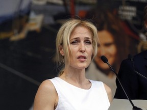 Actor Gillian Anderson speaks at a gathering to celebrate the life of murdered British MP Jo Cox, in Trafalgar Square, London, Wednesday, June 22, 2016. The East Coast seal hunt has another celebrity foe: X-Files star Gillian Anderson.Anderson called Wednesday on Prime Minister Justin Trudeau to end the annual commercial hunt. (THE CANADIAN PRESS/AP/Alastair Grant)