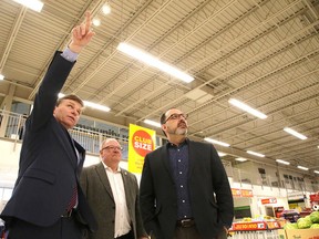 Mark Schembri of Loblaw Companies Limited  gives a tour of the Lasalle Real Canadian Superstore to MPP and Minister of Energy Glenn Thibeault and Greater Sudbury Mayor Brian Bigger on Wednesday. Thibeault was on hand to recognize the company as an energy efficiency leader in Ontario. (Gino Donato/Sudbury Star)