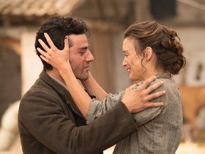 This image released by Open Road Films shows Oscar Isaac , left, and Charlotte Le Bon in a scene from "The Promise." (Jose Haro/Open Road Films via AP)