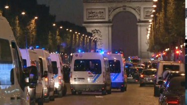 This image made from AP video shows police attending an incident on the Champs Elysees in Paris in which a police officer was killed along with an attacker in a shooting, Thursday April 20, 2017. (AP Photo)