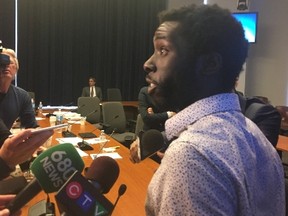 Desmond Cole at the Toronto Police Services Board meeting on Thurs., April 20, 2017. The meeting adjourned after Cole refused to give up the speaker's podium. (KEVIN CONNOR/Toronto Sun)