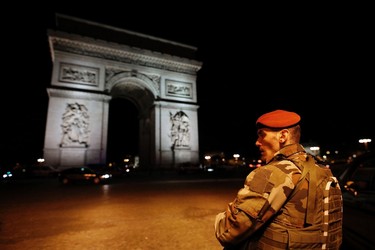 A soldier stand guards near the Arc de Triomphe after a shooting at the Champs Elysees in Paris on April 20, 2017. BENJAMIN CREMEL/AFP/Getty Images