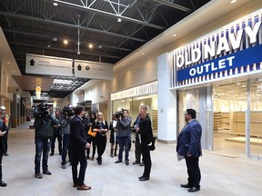 John Scott, senior vice-president of development for Ivanhoe Cambridge, leads a media sneak peek of Outlet Collection Winnipeg on Thurs., April 20, 2017. The outlet shopping centre on Sterling Lyon Parkway is scheduled to open on May 3. Kevin King/Winnipeg Sun/Postmedia Network