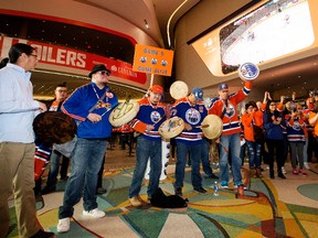 Members of the Logan Alexis Singers, a First Nations drumming group, perform in Ford Hall prior to the start of the Edmonton Oilers and San Jose Sharks game at Rogers Place, in Edmonton Thursday April 20, 2017. Photo by David Bloom/Postmedia