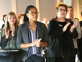 An audience looks on as Daniel Giroux, president of College Boreal, announces the results of Colleges Ontario's 2016-2017 Key Performance Indicators on Wednesday. Boreal received the top-ranking position in three out of five areas surveyed. (John Lappa/Sudbury Star)