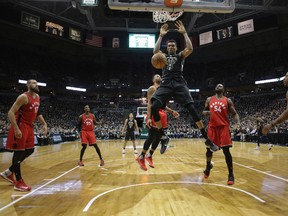 Milwaukee Bucks' Giannis Antetokounmpo dunks during Game 3 against the Toronto Raptors on April 20, 2017. (AP Photo/Morry Gash)