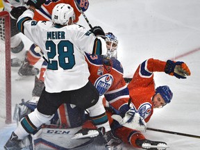 Edmonton Oilers' Zack Kassian and San Jose Sharks' Timo Meier crash into Oilers goalie Cam Talbot during Game 5 of their opening round playoff series at Rogers Place in Edmonton on Thursday, April 20, 2017. (Ed Kaiser)